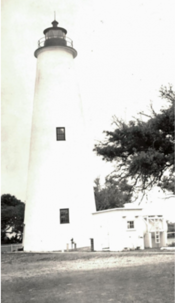 Ocracoke Lighthouse on May 29, 1941. Notice the black trim on the window sashes and the exterior parge finish of the lighthouse before the application of the thick shotcrete coating (sometimes called gunite) in the early 1950s.